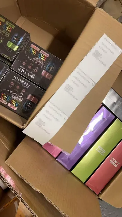 Genuine IGET Moon Mr Blue order packed for dispatch — shipping label blurred for privacy